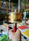 Prayer wheel in Nepal Om Mani Padme Hum