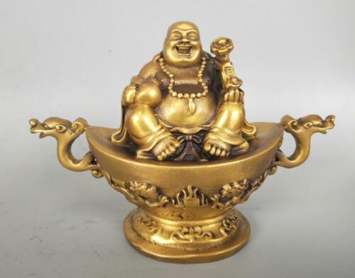 Buddha statue <br> Golden teapot