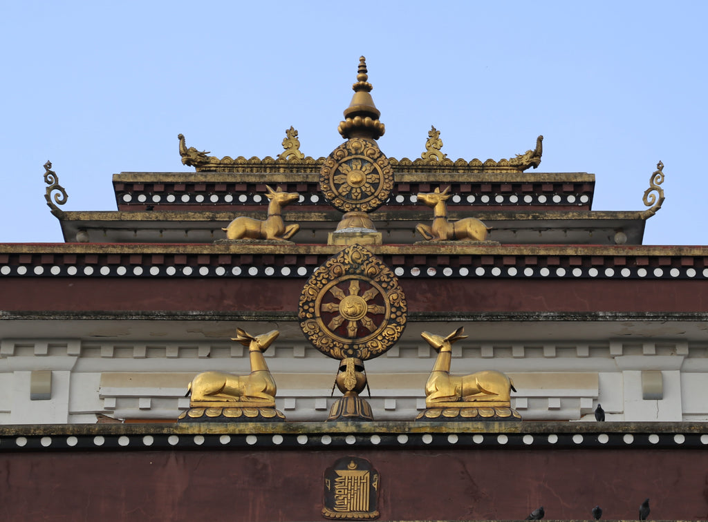 Cerf et roue du dharma